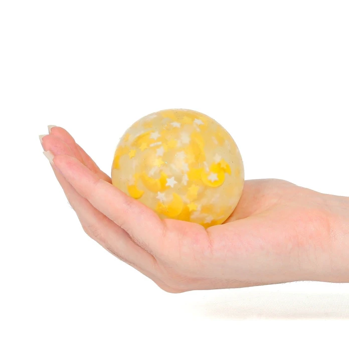 Pelota antiestrés sensorial - Lunas y estrellas fosforescentes
