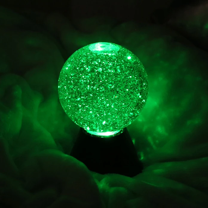 Bola luminosa con purpurina